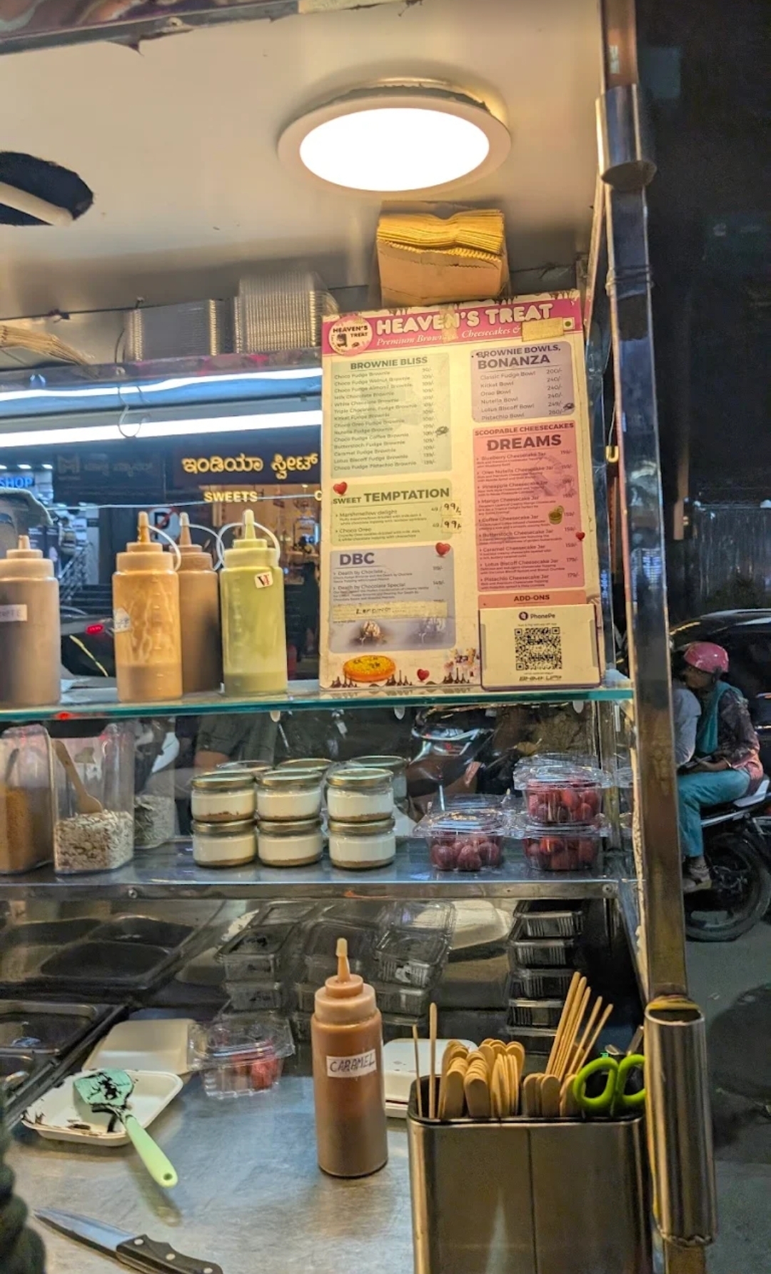 Menu board and cheesecake jars on display